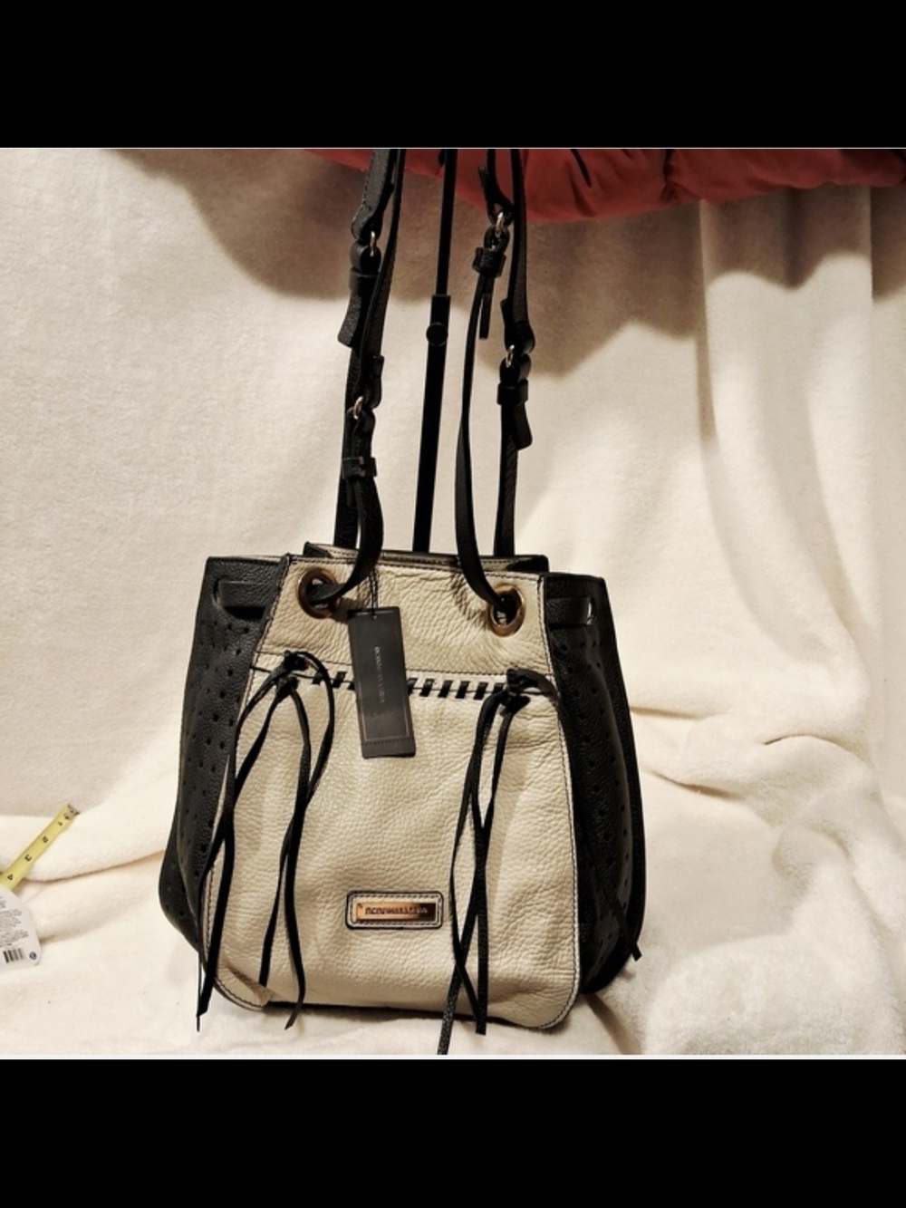 BCBGMaxAzria Black and Cream Drawstring Bucket Satchel